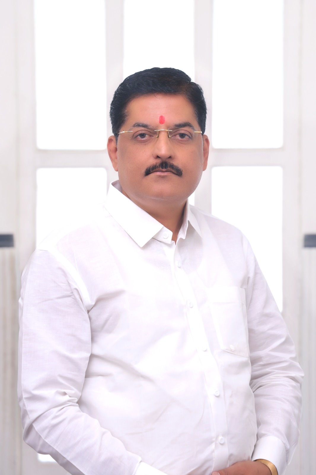 Chairperson - Shri. Vinod Arvind Gaikwad